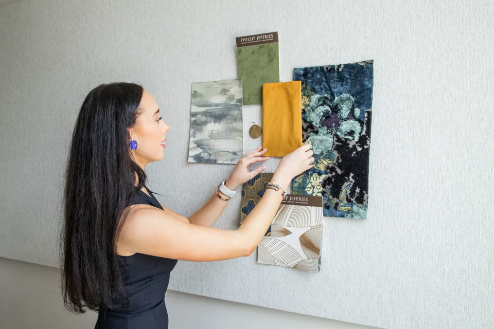 A designer working in a bright studio